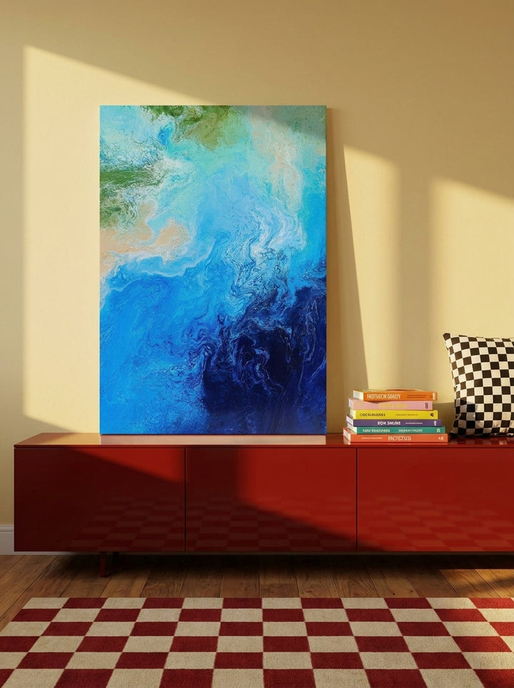 Stretched canvas wall art standing on a sideboard in a colourful eclectic bedroom