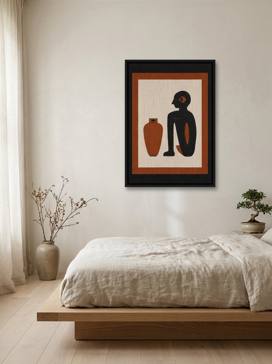 Canvas wall art with a black surround styled on the wall in a warm Japandi bedroom