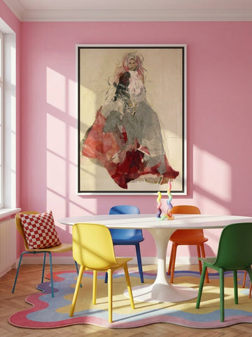 Canvas wall art with a white surround styled on the wall in a colourful eclectic dining room