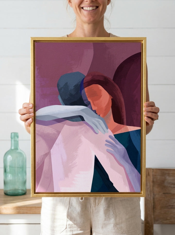 Person holding canvas wall art with a gold leaf surround in a coastal living room