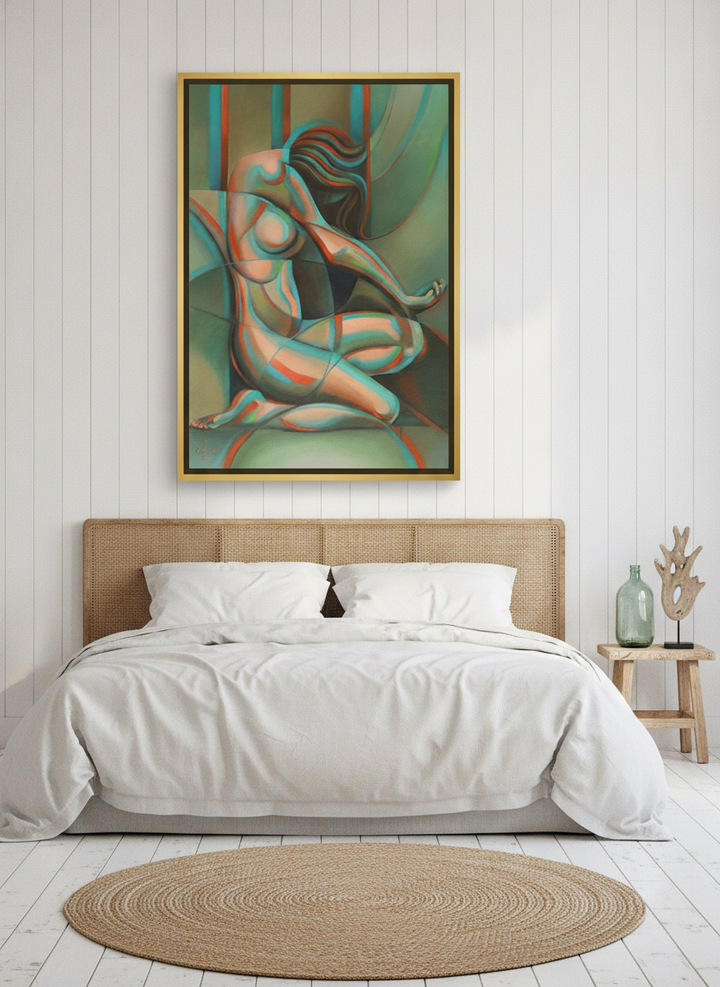 Canvas wall art with a gold leaf surround styled on the wall in a coastal bedroom