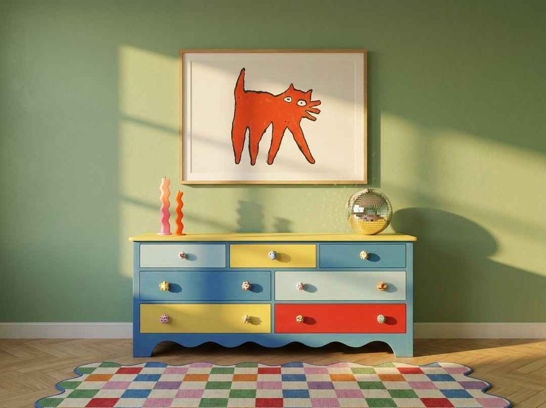 Modern wall art print styled on the wall in a colourful eclectic nursery