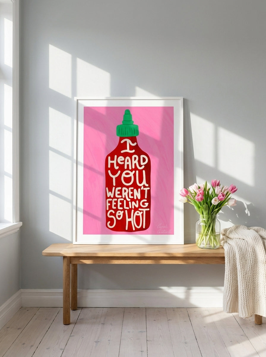 Modern wall art print standing on a bench in a bright Scandinavian dining room