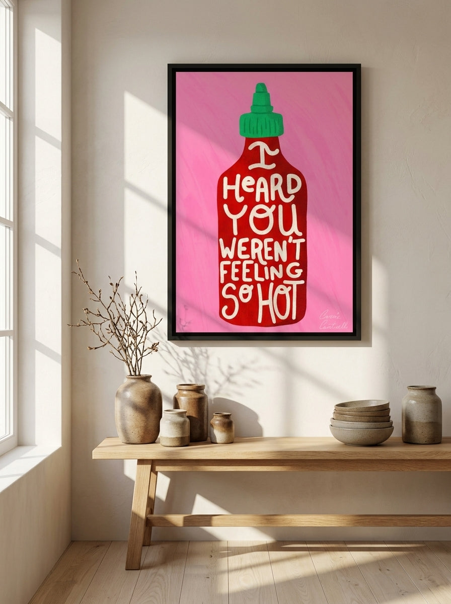 Canvas wall art with a black surround styled on the wall in a warm Japandi kitchen