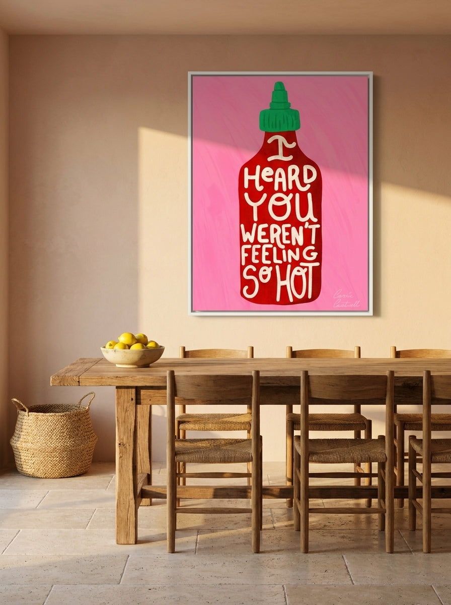 Oversized statement canvas wall art with a white surround styled on the wall in a Mediterranean dining room