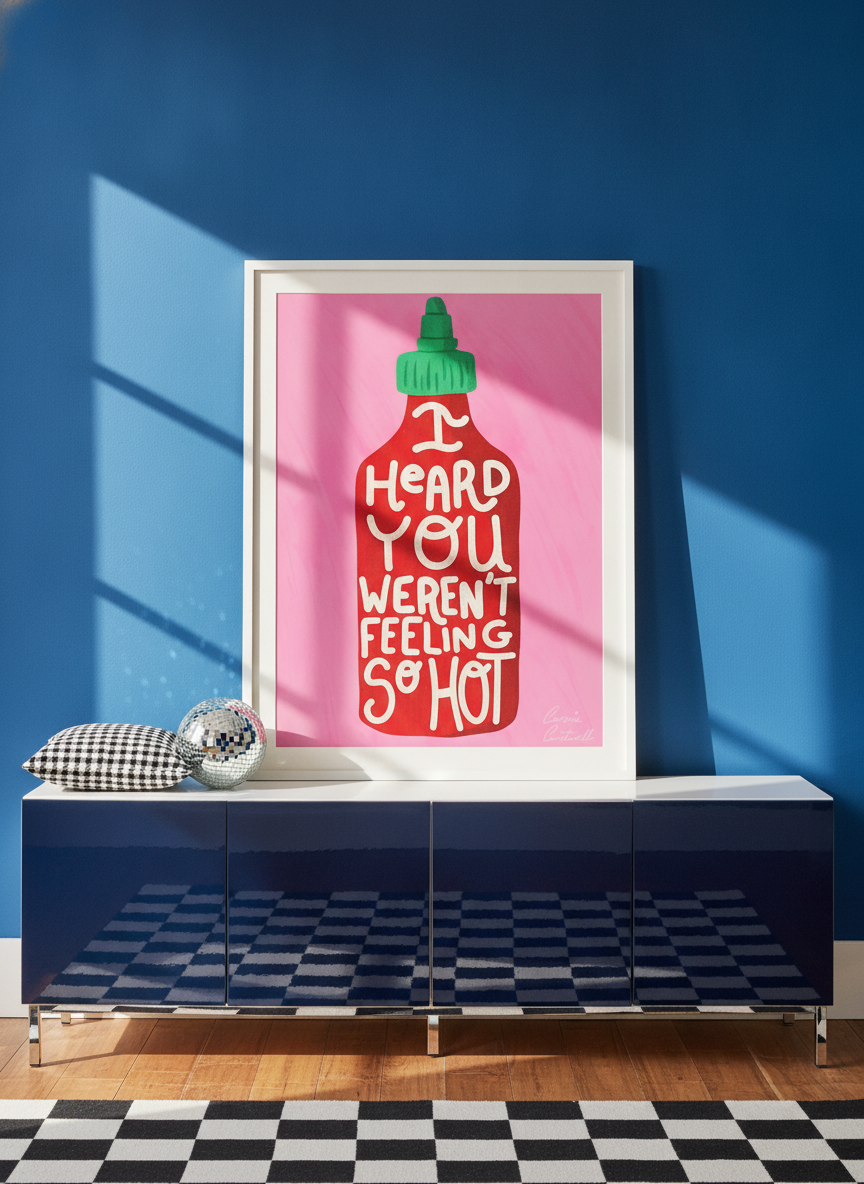 Modern wall art print standing on a sideboard in a colourful eclectic bedroom