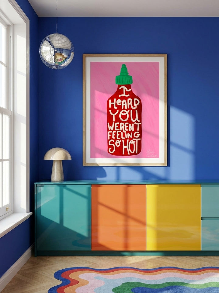 Modern wall art print styled on the wall in a colourful eclectic kitchen