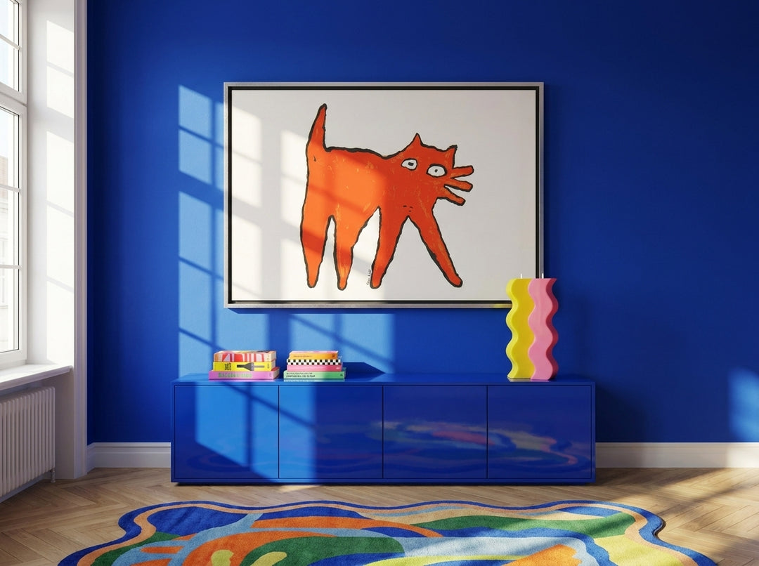 Oversized statement canvas wall art with a silver leaf surround styled on the wall in a colourful eclectic living room