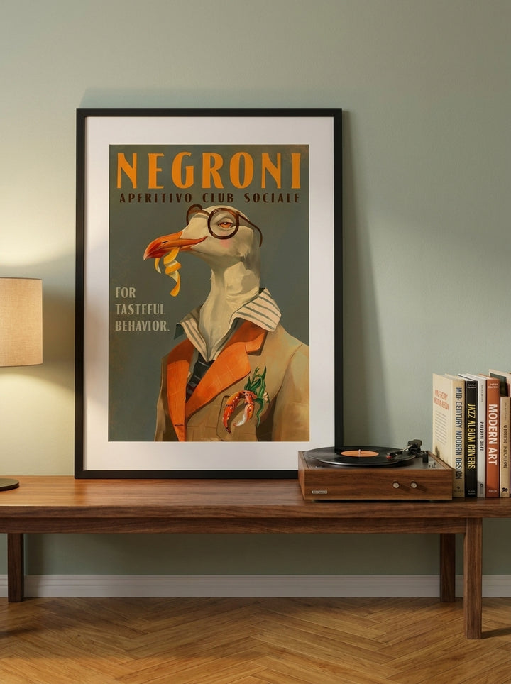 Modern wall art print standing on a kitchen bench in a mid-century kitchen