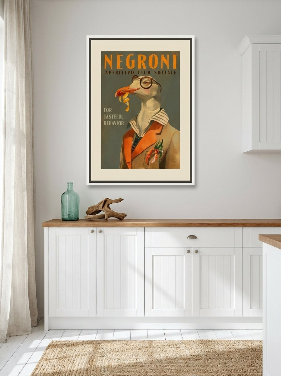 Canvas wall art with a white surround styled on the wall in a coastal kitchen