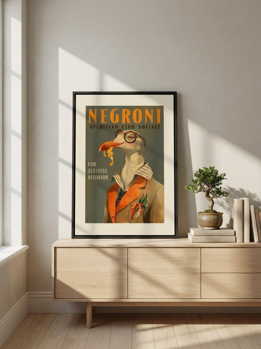 Canvas wall art with a black surround standing on a sideboard in a warm Japandi dining room
