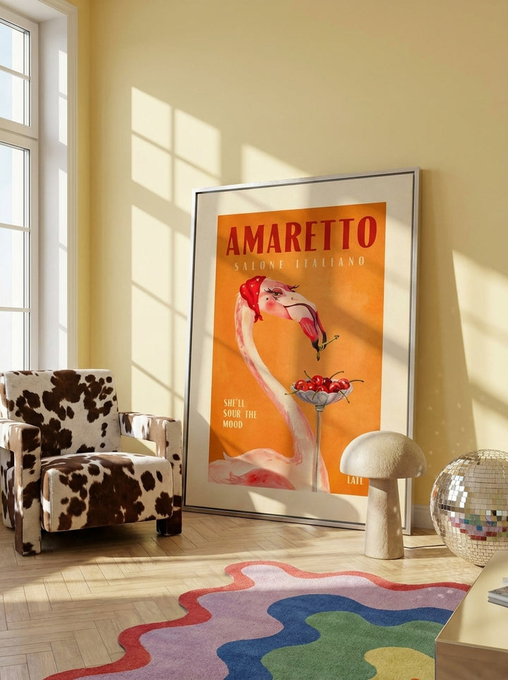 Canvas wall art with a silver leaf surround leaning against the wall in a colourful eclectic living room