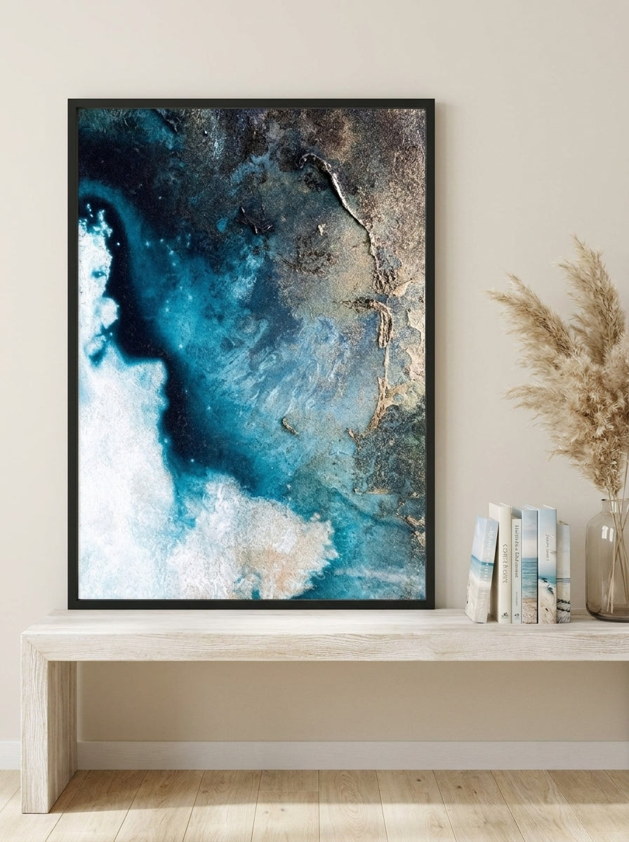 Modern wall art print standing on a console in a coastal home office