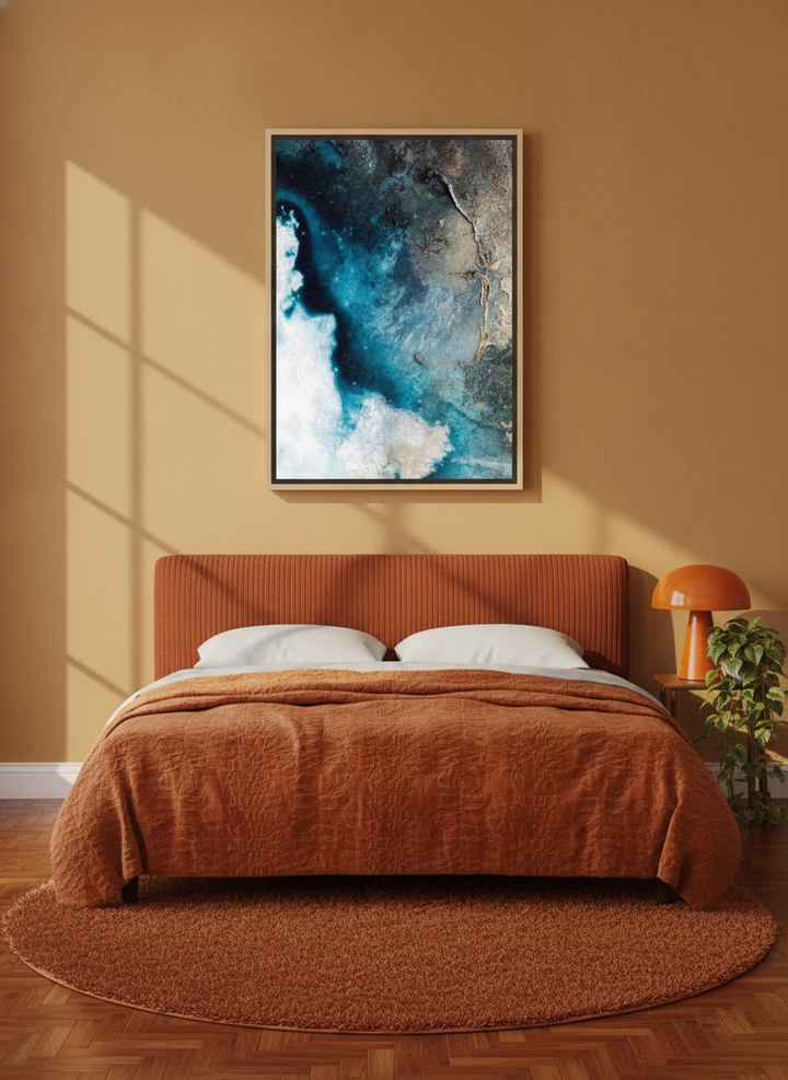 Canvas wall art with a natural timber surround styled on the wall in a retro 70s bedroom