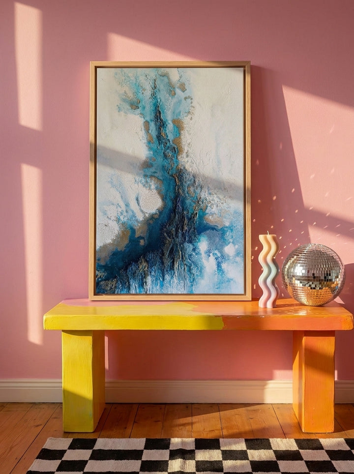 Canvas wall art with a natural timber surround standing on a side table in a colourful eclectic home office