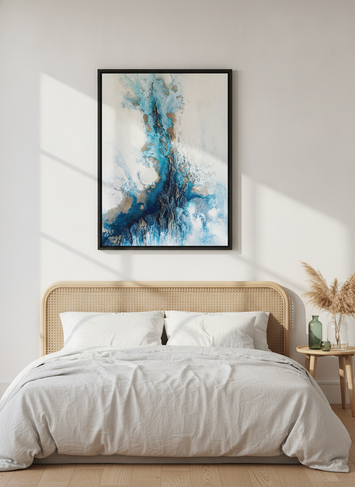 Modern wall art print styled on the wall in a coastal bedroom
