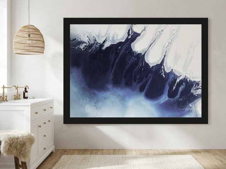 Modern wall art print styled on the wall in a bright Scandinavian bathroom
