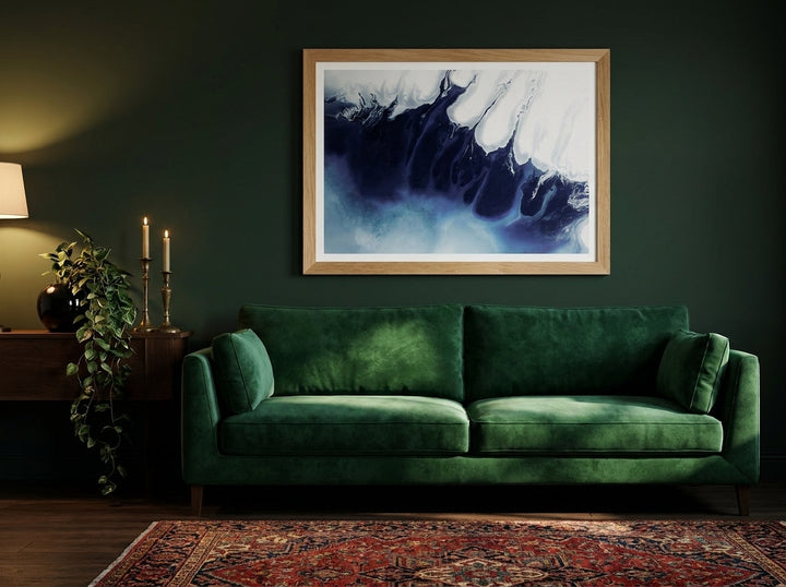 Modern wall art print styled on the wall in a moody living room
