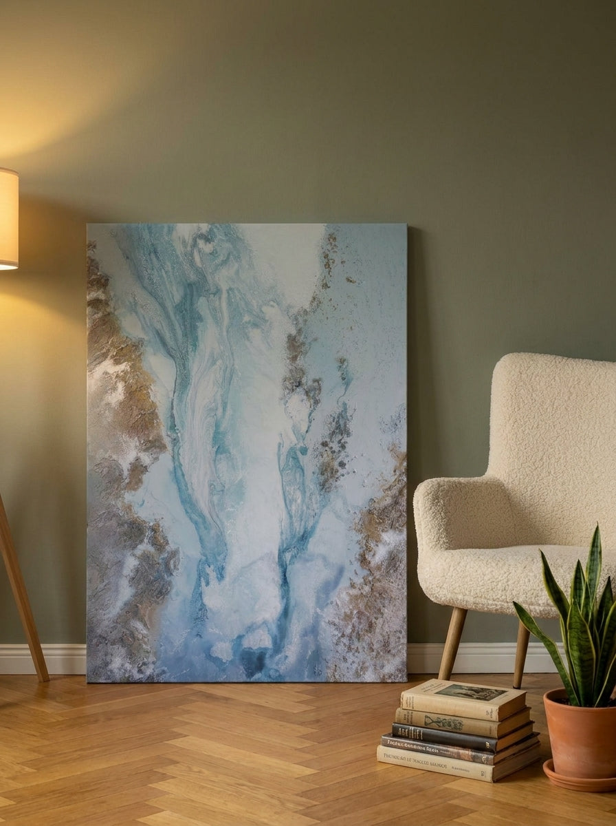 Stretched canvas wall art leaning against the wall in a mid-century bedroom
