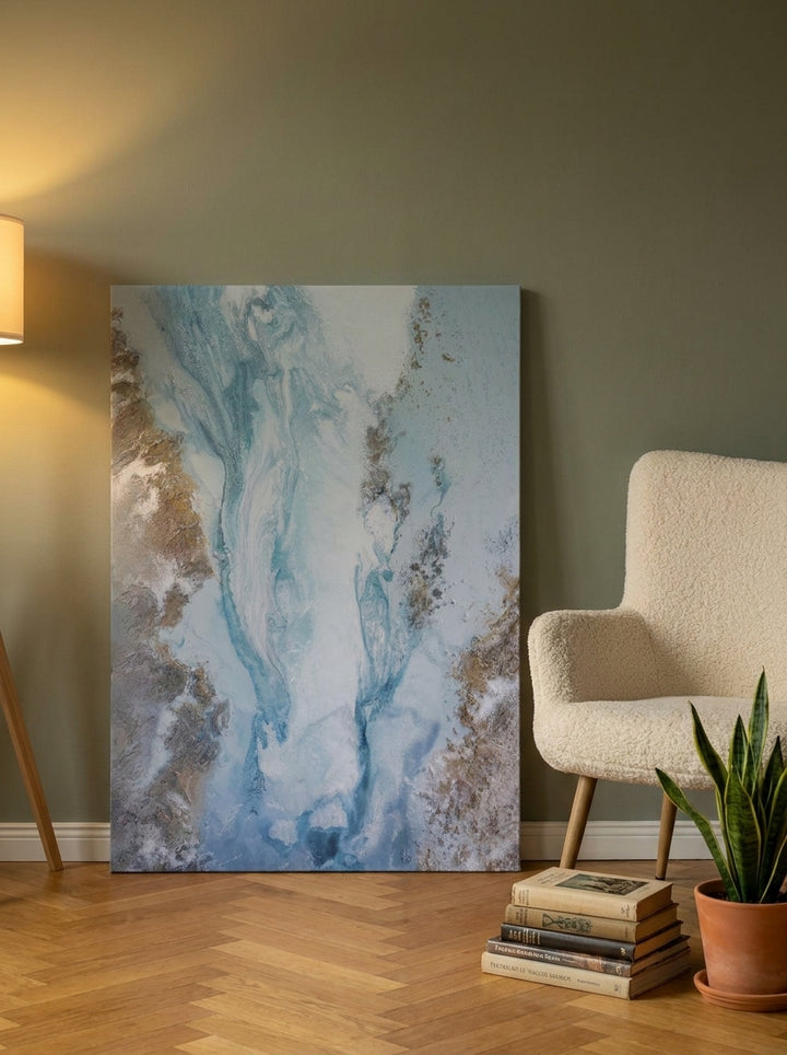 Stretched canvas wall art leaning against the wall in a mid-century bedroom