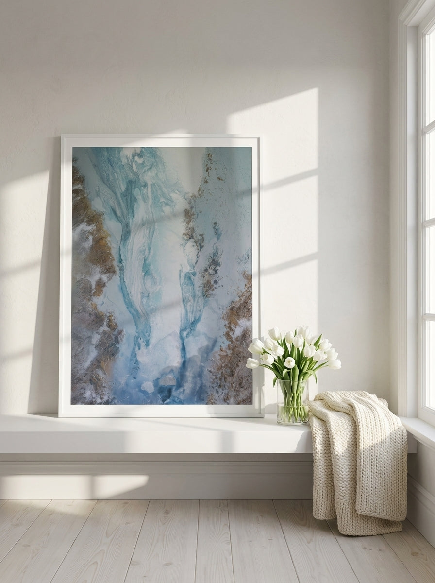 Modern wall art print standing on a shelf in a bright Scandinavian home office