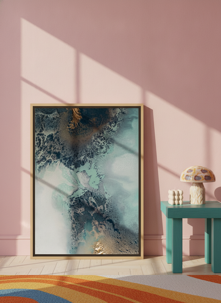 Canvas wall art with a natural timber surround leaning against the wall in a colourful eclectic home office
