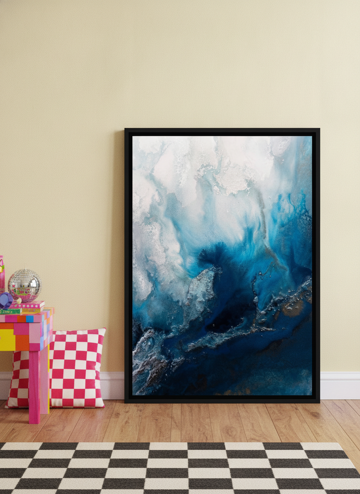 Canvas wall art with a black surround leaning against the wall in a colourful eclectic bedroom
