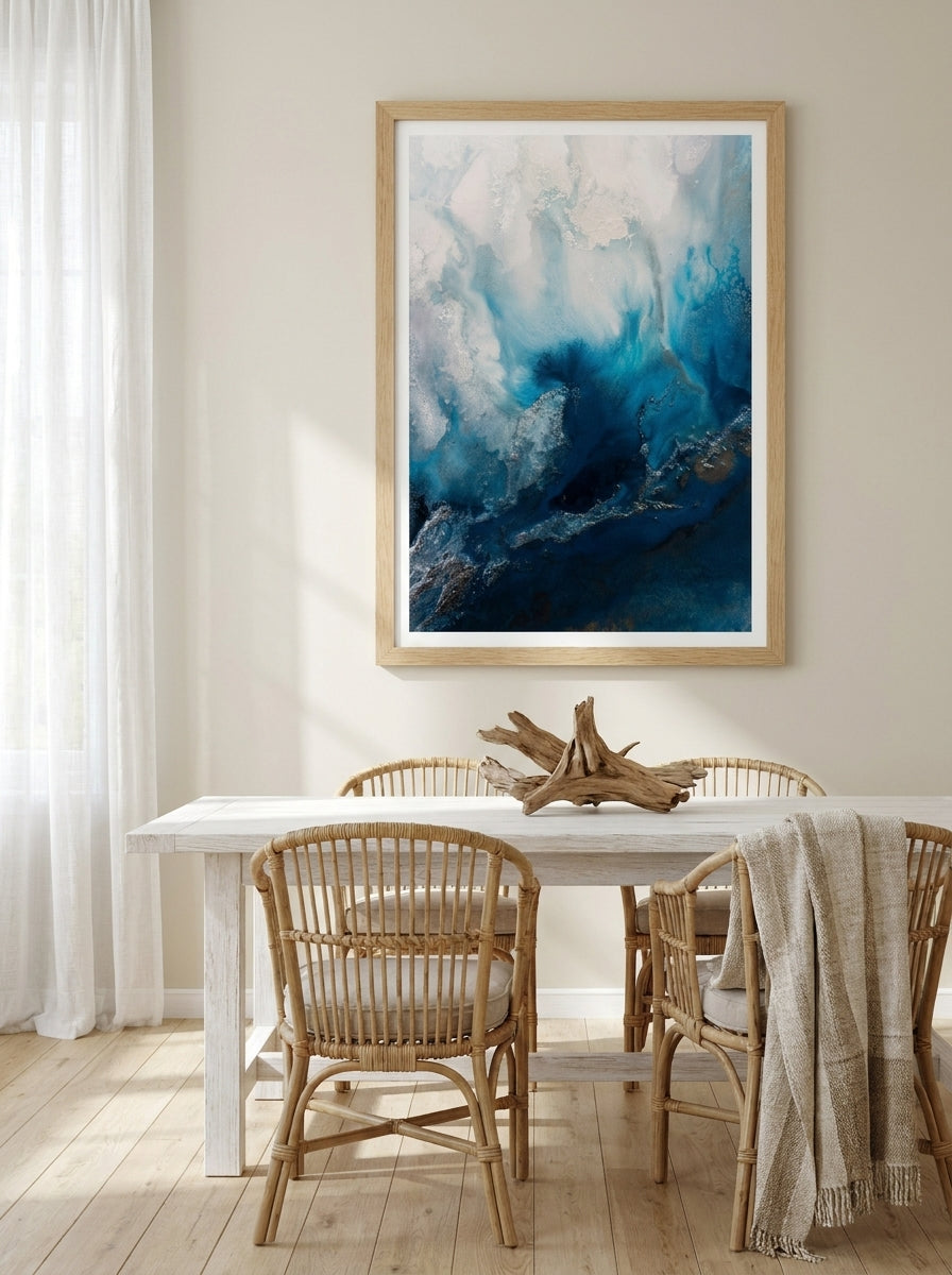 Modern wall art print styled on the wall in a coastal dining room