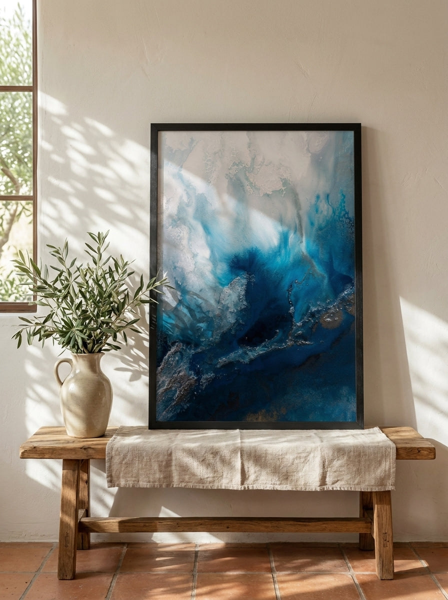 Modern wall art print standing on a bench in a Mediterranean home office