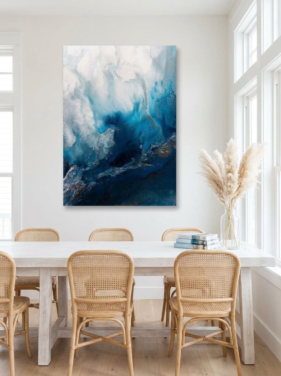 Stretched canvas wall art styled on the wall in a coastal dining room
