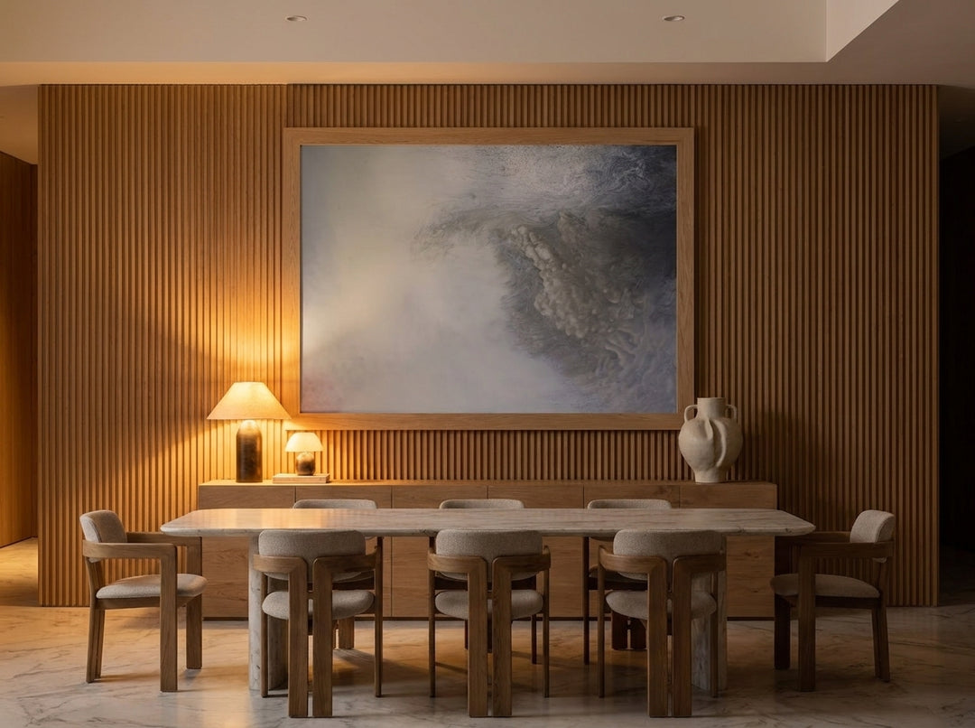 Oversized statement modern wall art print styled on the wall in a luxe dining room