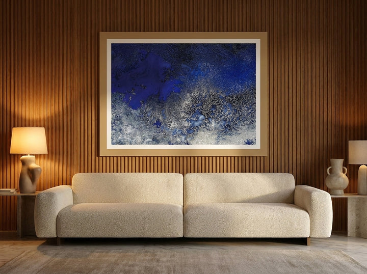 Modern wall art print styled on the wall in a luxe living room