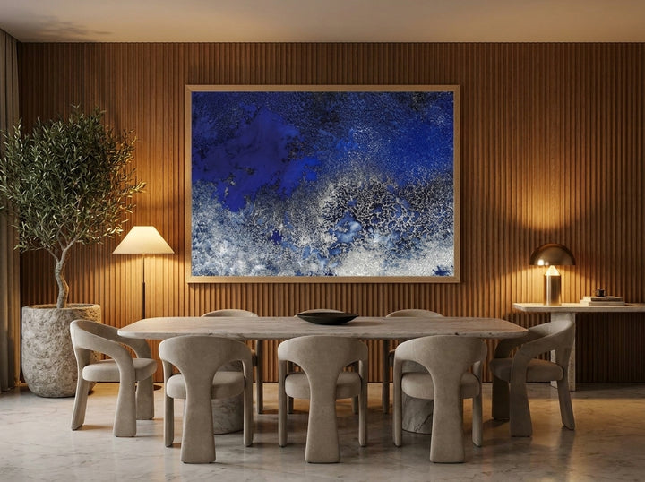 Oversized statement modern wall art print styled on the wall in a luxe dining room