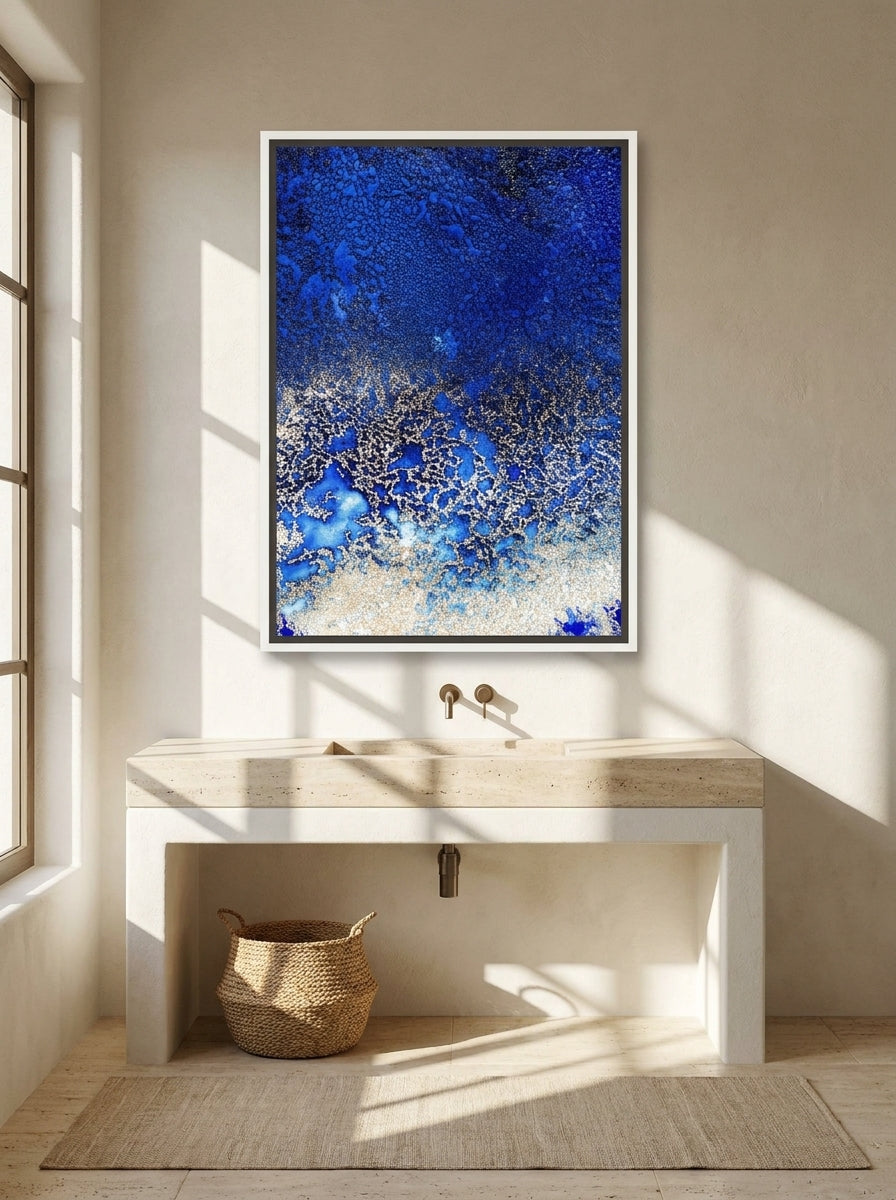 Canvas wall art with a white surround styled on the wall in a Mediterranean bathroom