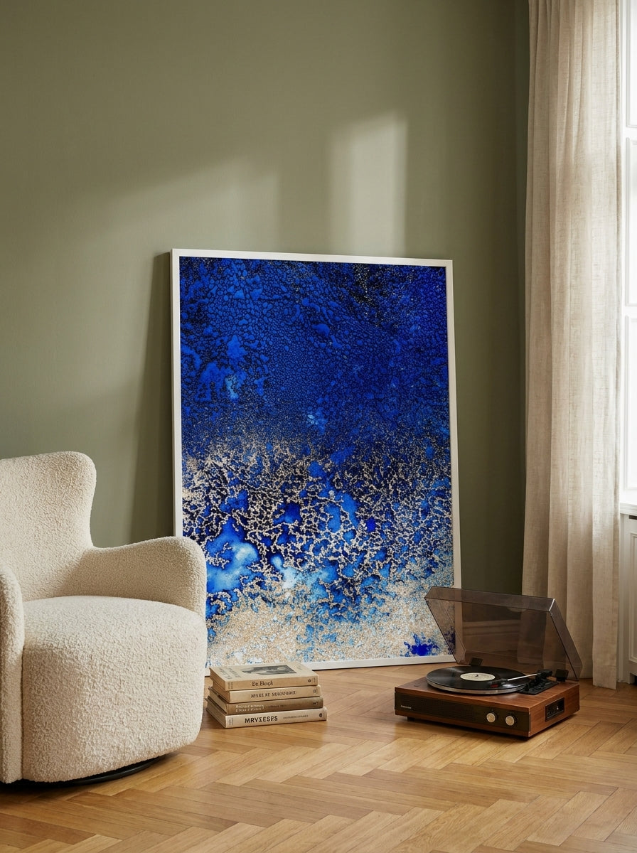 Oversized statement modern wall art print leaning against the wall in a mid-century living room