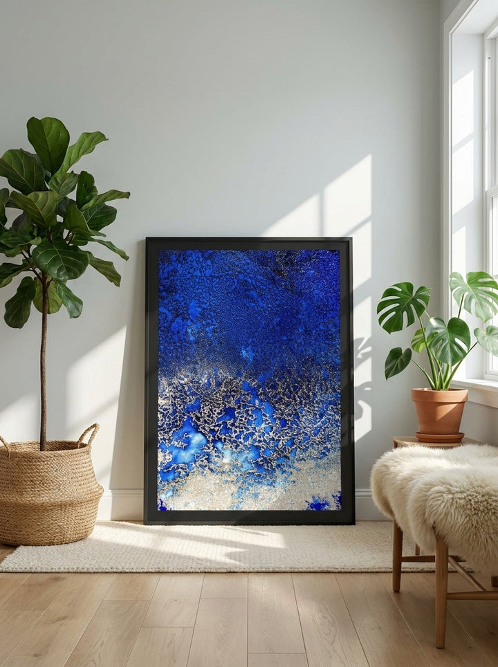 Modern wall art print leaning against the wall in a bright Scandinavian bathroom
