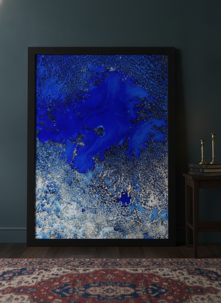 Modern wall art print leaning against the wall in a moody home office