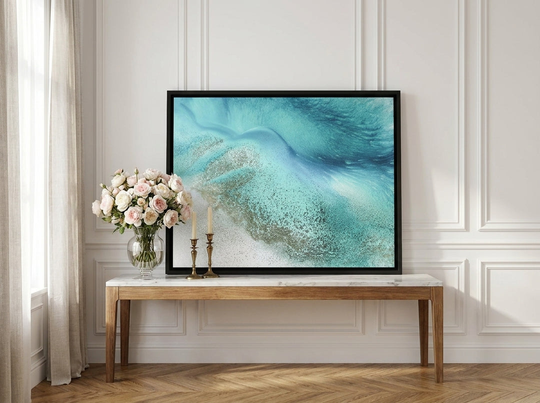 Canvas wall art with a black surround standing on a console in a Parisian bathroom