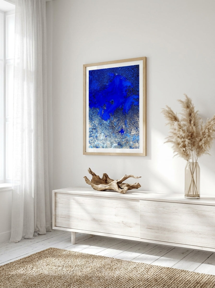 Modern wall art print styled on the wall in a coastal living room