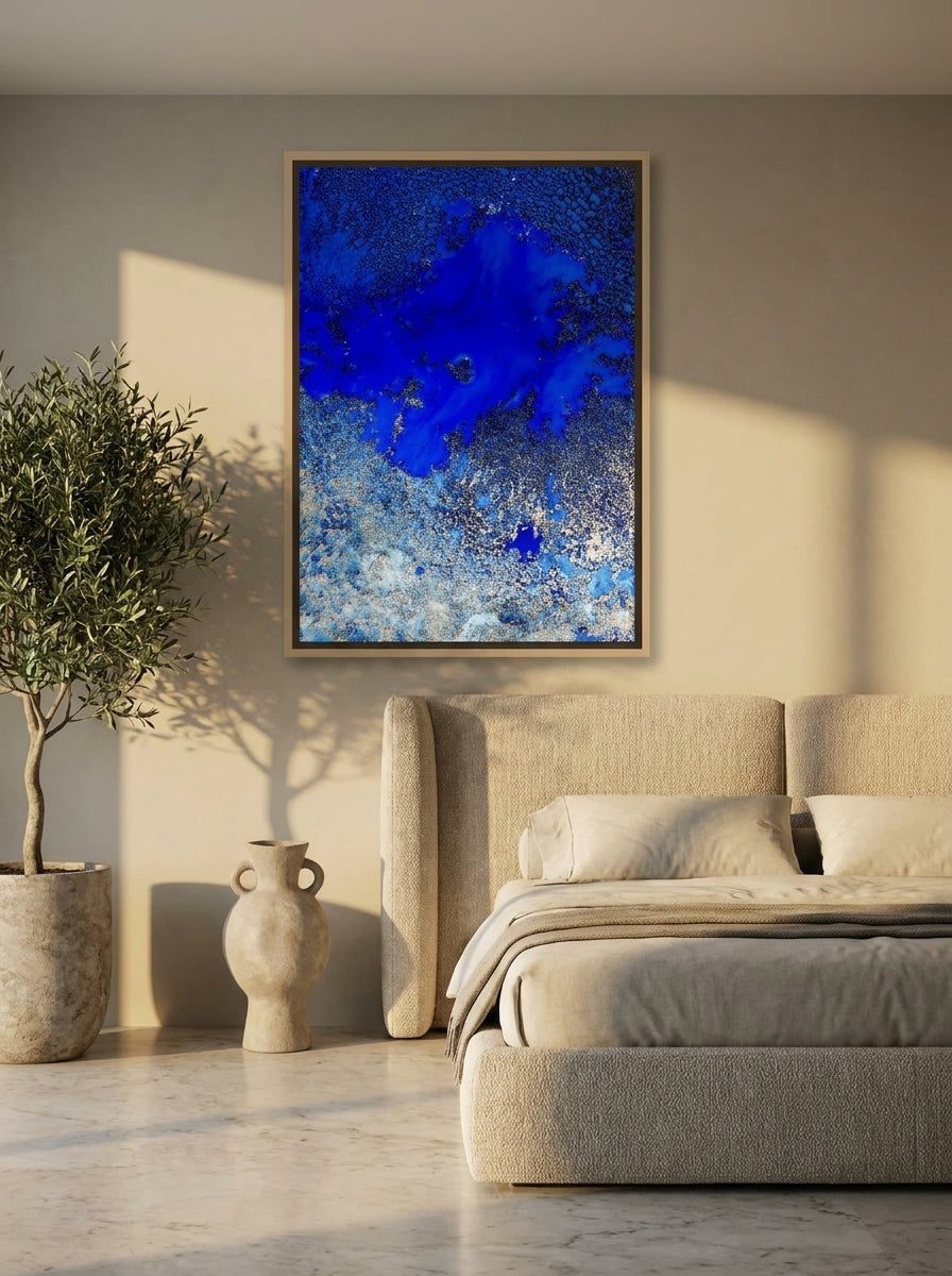 Oversized statement canvas wall art with a natural timber surround styled on the wall in a luxe bedroom
