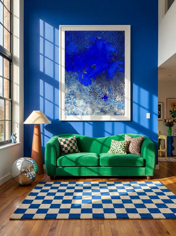 Oversized statement modern wall art print styled on the wall in a colourful eclectic living room