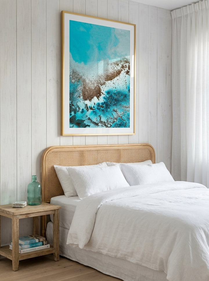Modern wall art print styled on the wall in a coastal bedroom