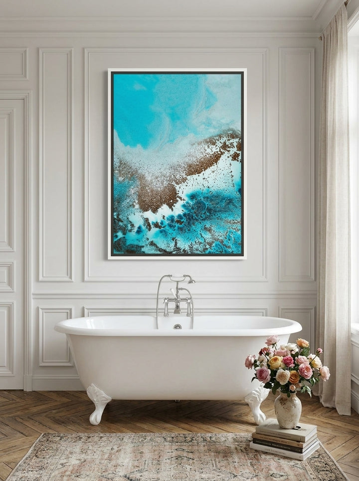 Canvas wall art with a white surround styled on the wall in a Parisian bathroom