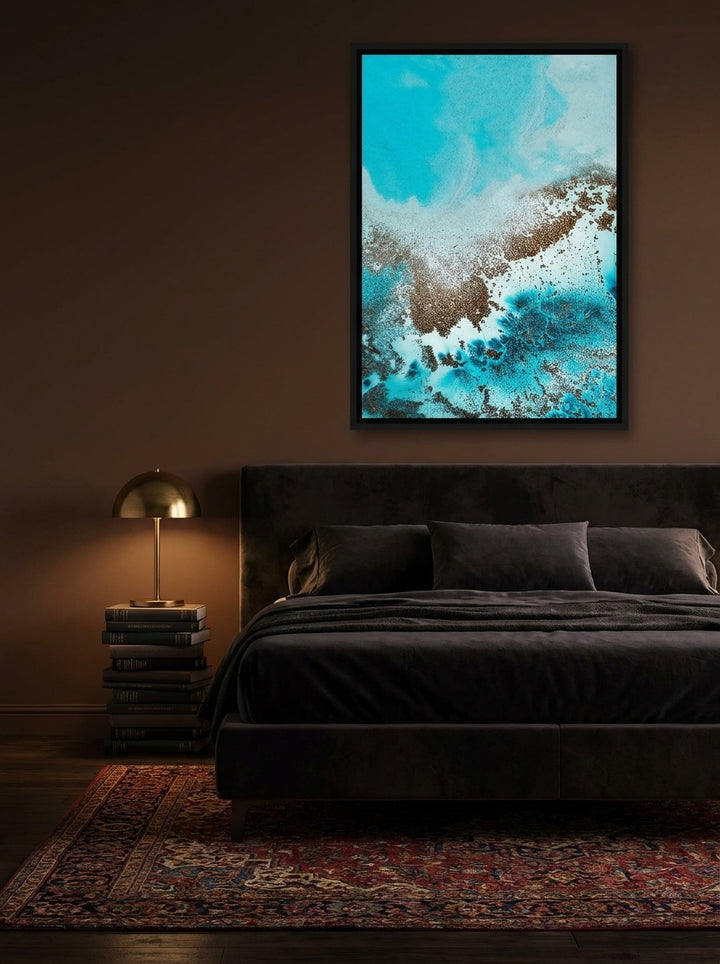Canvas wall art with a black surround styled on the wall in a moody bedroom