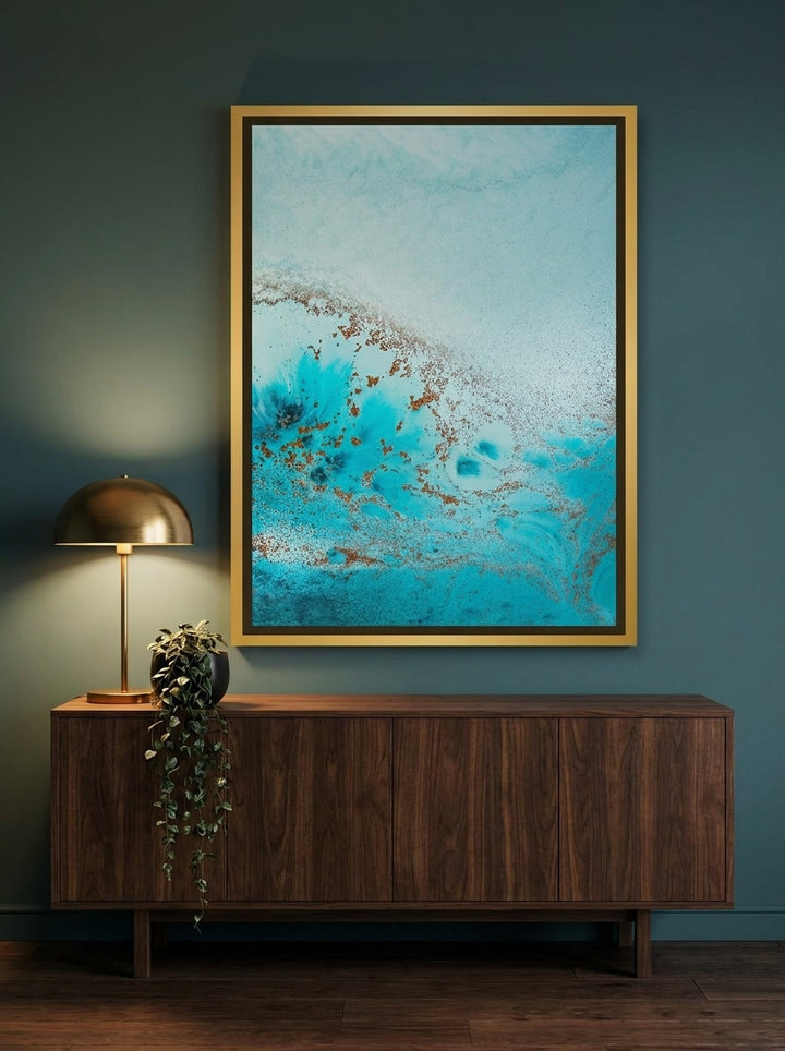 Canvas wall art with a gold leaf surround styled on the wall in a moody living room