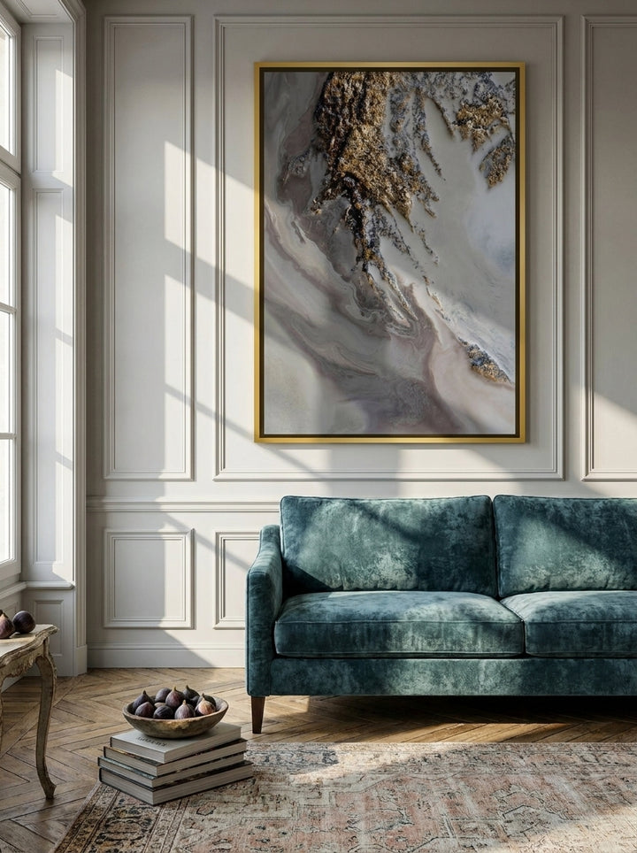 Oversized statement canvas wall art with a gold leaf surround styled on the wall in a Parisian living room