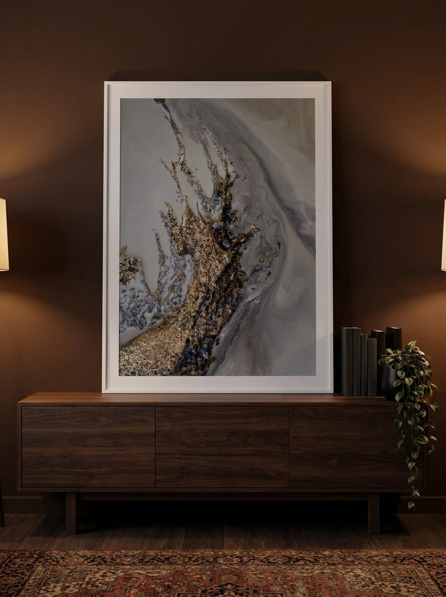 Modern wall art print standing on a sideboard in a moody bedroom