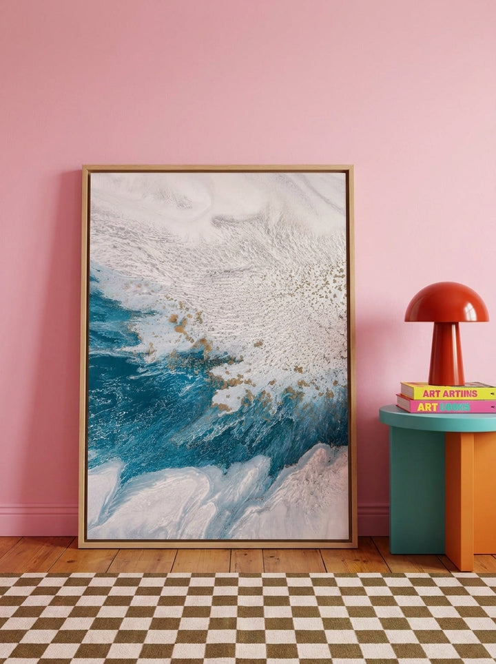 Canvas wall art with a natural timber surround leaning against the wall in a colourful eclectic bedroom
