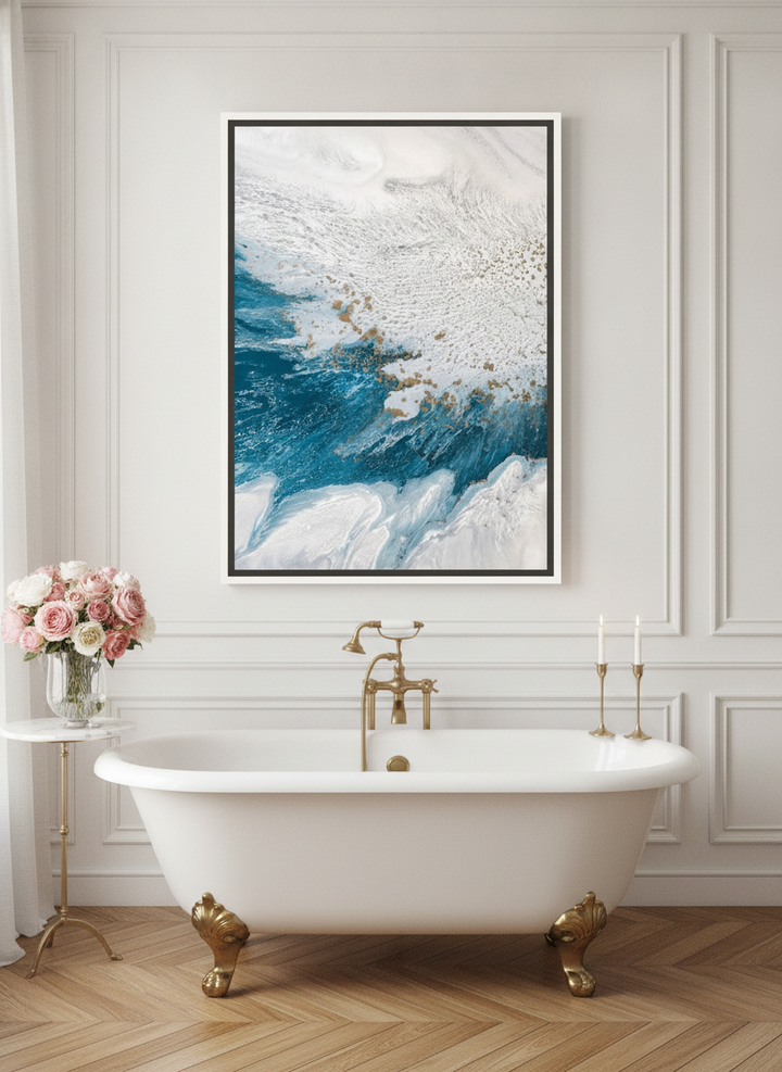 Canvas wall art with a white surround styled on the wall in a Parisian bathroom