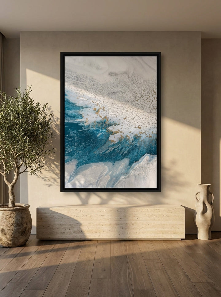 Oversized statement canvas wall art with a black surround styled on the wall in a luxe living room